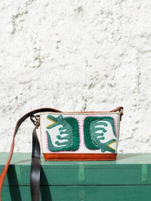 Crocodile embroidered leather sling bag