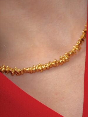 Molten amorphous beaded necklace with 22KT gold plating on premium brass alloy