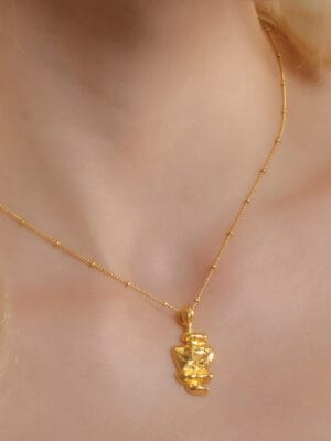 Gold Pratapgari patrimony totem carved charm necklace with 22KT real gold plating on brass alloy