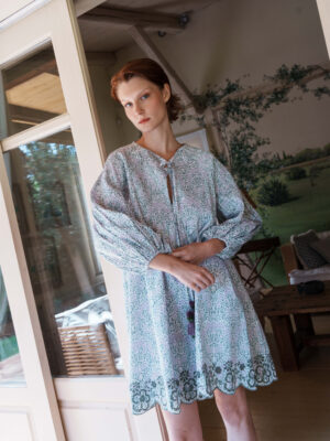 Green and lilac printed poplin dress with schfflie hemline