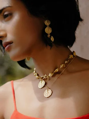 Embossed snake medallion necklace with round coin pendant in 22KT gold plated brass alloy