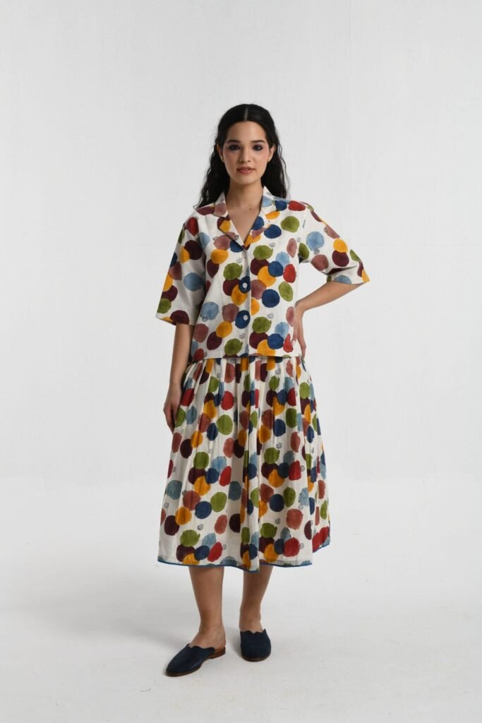 VOID POLKA PLEATED SKIRT